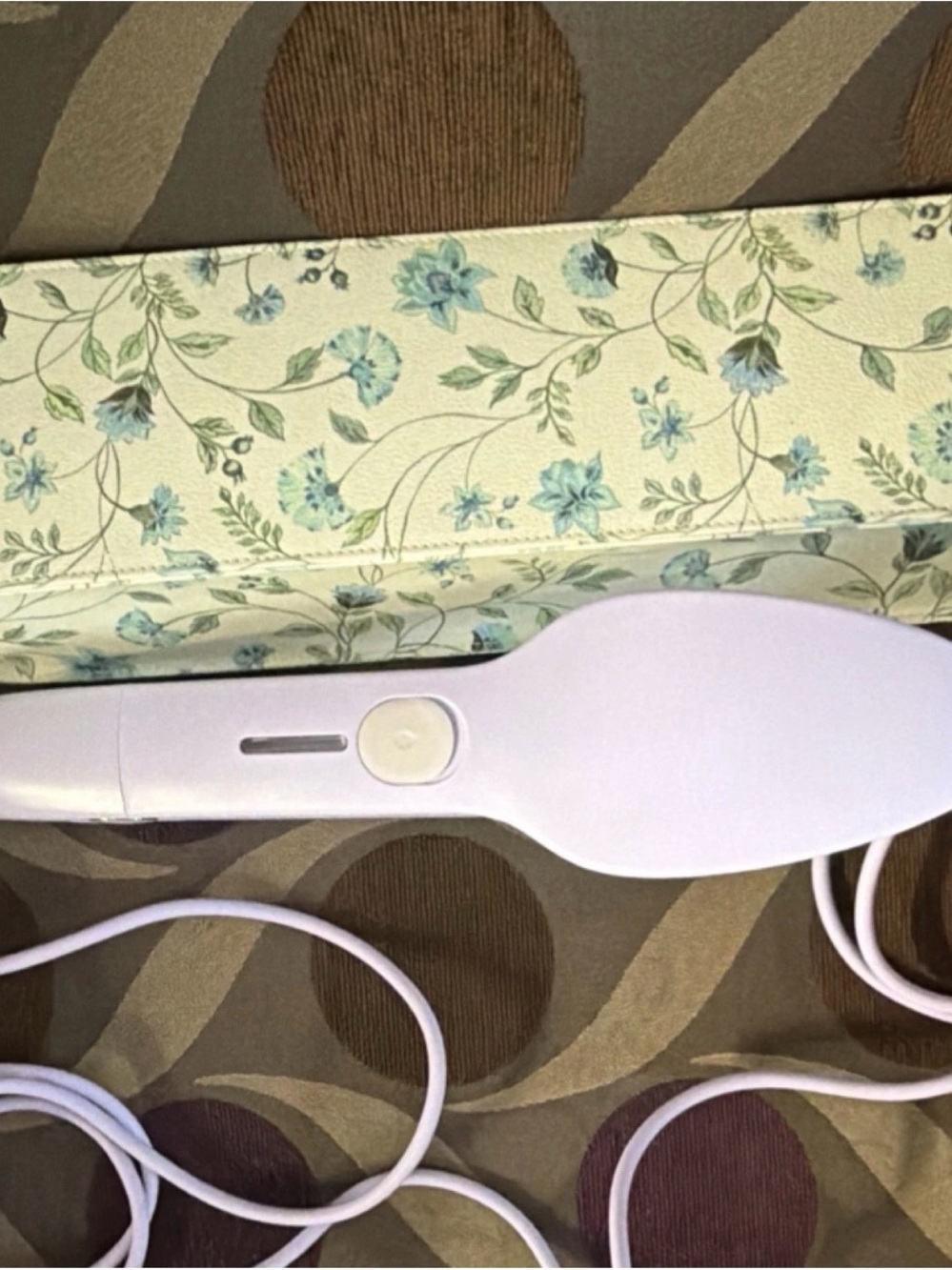 Neely & Chloe travel case with Nori Portable Fabric Steamer with floral pouch